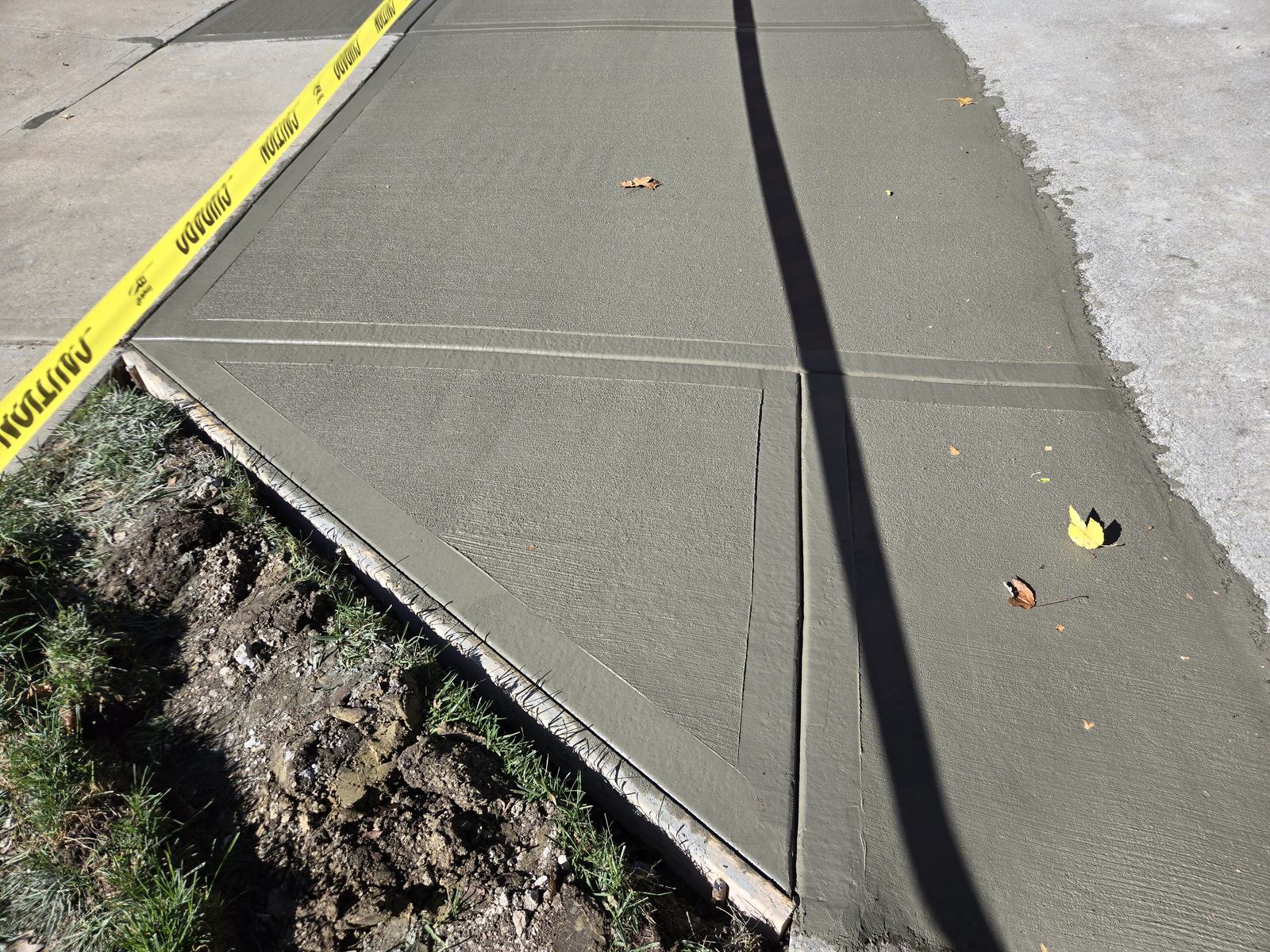 New driveway apron and sidewalk